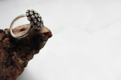 Close-up of cigarette against white background