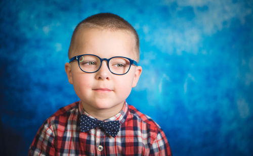 Portrait of cute boy wearing eyeglasses