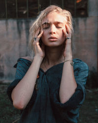 Portrait of teenage girl standing outdoors