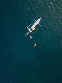 High angle view of people on boat in sea