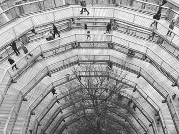 High angle view of people walking on boardwalk