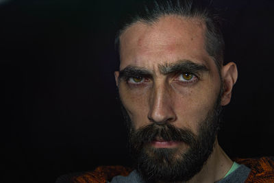 Close-up portrait of a serious man