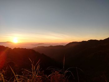 Scenic view of mountains at sunset