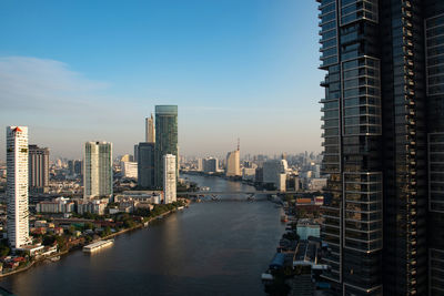 Modern buildings in city against sky