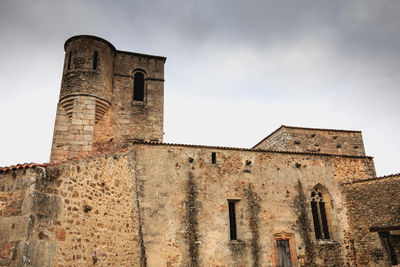 Low angle view of historical building against sky