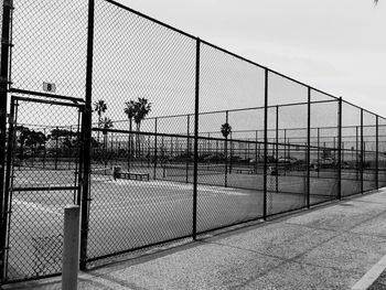 Chainlink fence against sky