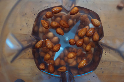 High angle view of roasted coffee beans on table