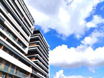 Low angle view of skyscraper against sky