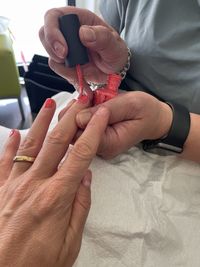 Close-up of people holding hands