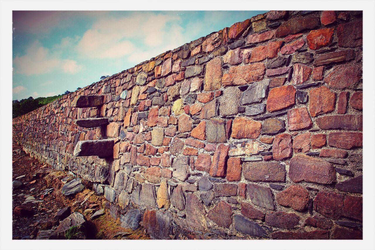 architecture, built structure, transfer print, building exterior, auto post production filter, brick wall, wall - building feature, sky, weathered, stone wall, low angle view, old, house, brick, wall, day, outdoors, window, abandoned, textured