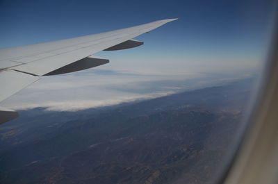 Aerial view of mountains against sky