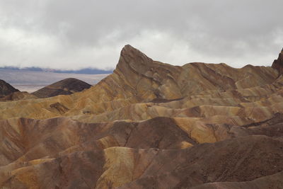 Scenic view of rocky mountains against sky