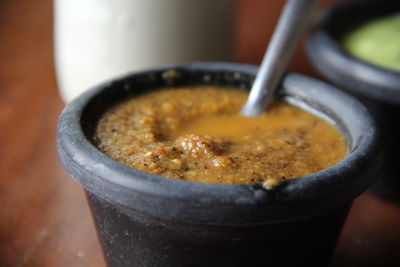 High angle view of soup in container on table