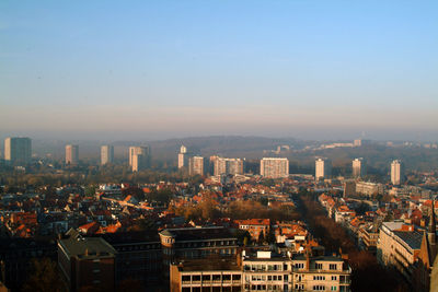 Cityscape against sky during sunset