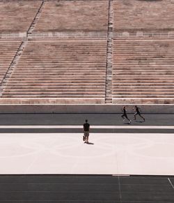 Group of people walking on road