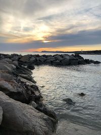 Scenic view of sea against sky during sunset