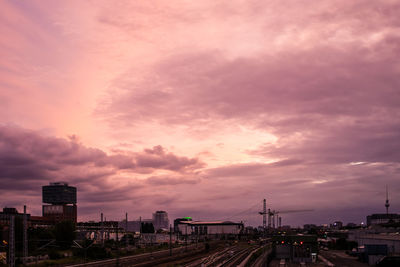 Cityscape against dramatic sky