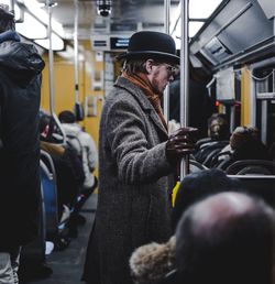 Man standing in train