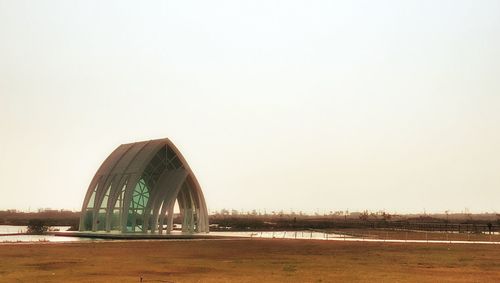 View of building in city against clear sky