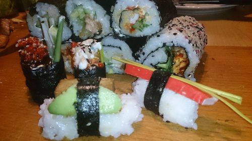 Close-up of sushi served on table