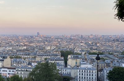 High angle view of townscape against sky at sunset