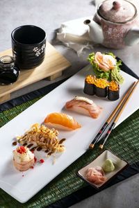 High angle view of sushi served on table