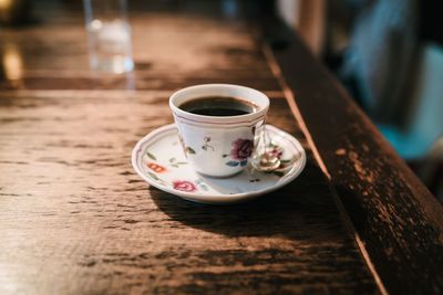 Coffee cup on table