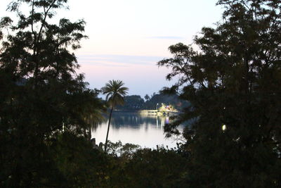 Scenic view of lake against sky during sunset