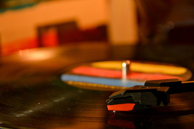 Close-up of piano on table