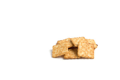 Close-up of cookies against white background