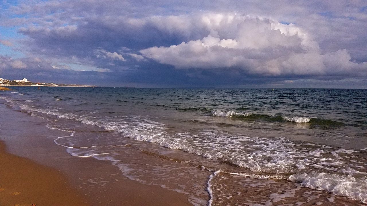sea, land, water, beach, sky, wind wave, wave, body of water, cloud, shore, ocean, environment, coast, horizon, beauty in nature, nature, scenics - nature, sand, motion, travel, travel destinations, landscape, surfing, horizon over water, water sports, sports, coastline, tourism, seascape, sunlight, outdoors, trip, vacation, sunset, water's edge, holiday, tranquility, tide, summer, dramatic sky, sun, blue, storm, day, cloudscape, tropical climate