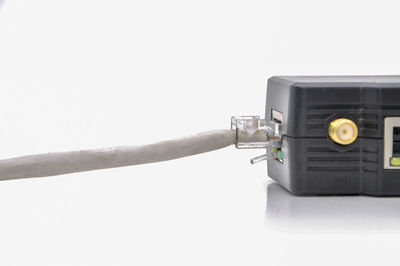 Low angle view of telephone pole against clear sky