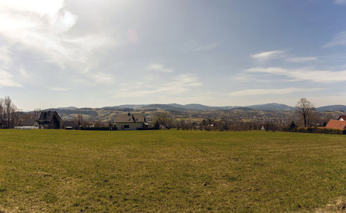 Scenic view of field against sky