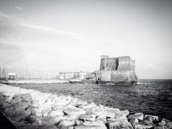 View of fort and sea against sky