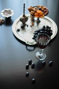 High angle view of wine glass on table
