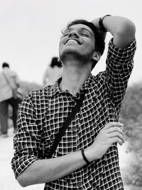 Portrait of young man looking away