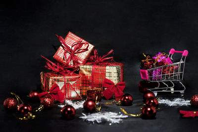 Illuminated christmas lights against black background