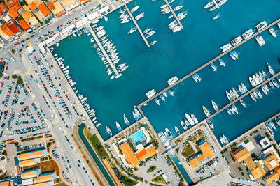 Aerial view of boats in harbor in lefkada city