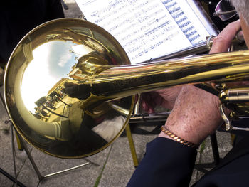 Cropped image of musician playing musical equipment