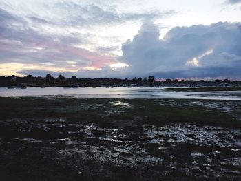 Scenic view of sea against cloudy sky