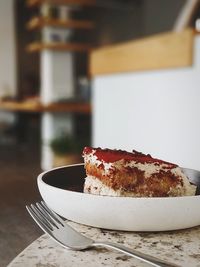 Close-up of cake in plate on table