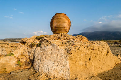 Stack of rock against sky