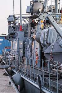 Cropped image of boat moored at harbor