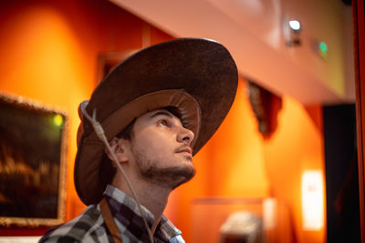 Portrait of young man looking away