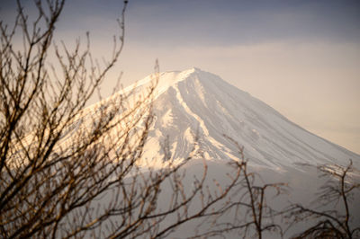 Scenic view of snowcapped mountain against sky