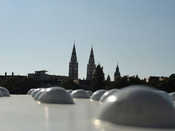 View of cityscape against clear sky