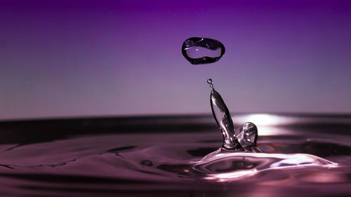 Close-up of drop on rippled water