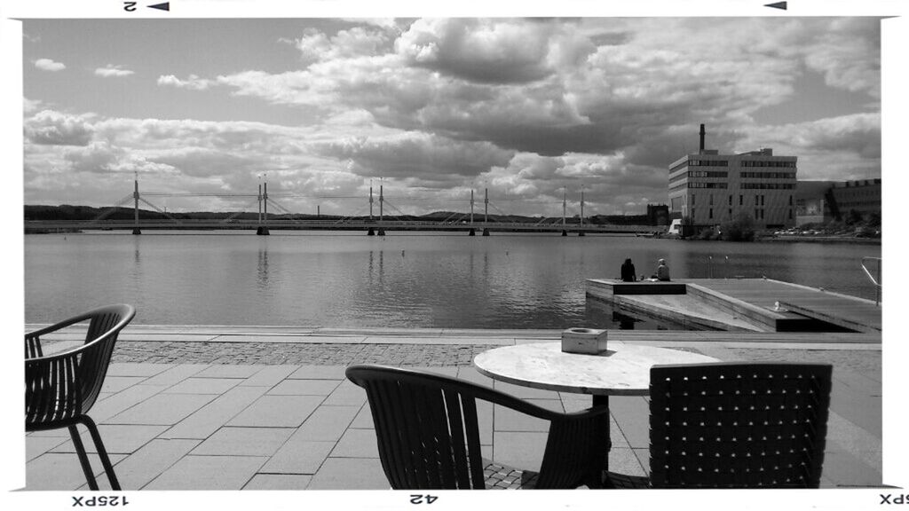 sky, transfer print, water, cloud - sky, architecture, nautical vessel, built structure, building exterior, auto post production filter, cloudy, cloud, sea, harbor, moored, chair, boat, city, day, transportation, river