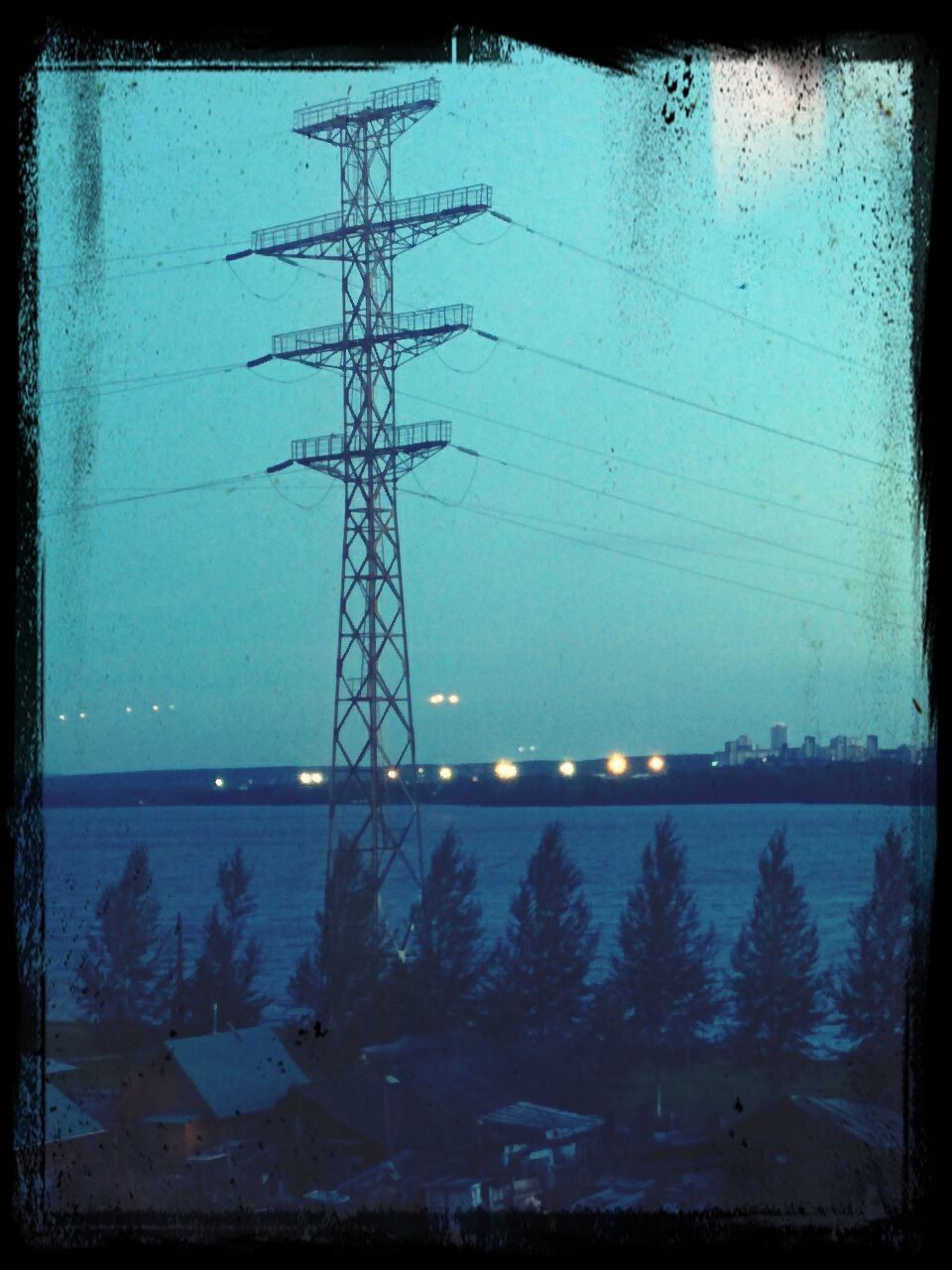 transfer print, auto post production filter, electricity pylon, electricity, water, power line, sky, connection, built structure, blue, power supply, dusk, fuel and power generation, clear sky, nature, architecture, tranquility, outdoors, technology, no people