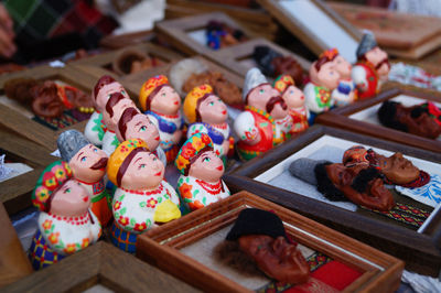 Mini handmade clay figures-souvenirs in ukrainian traditional clothes